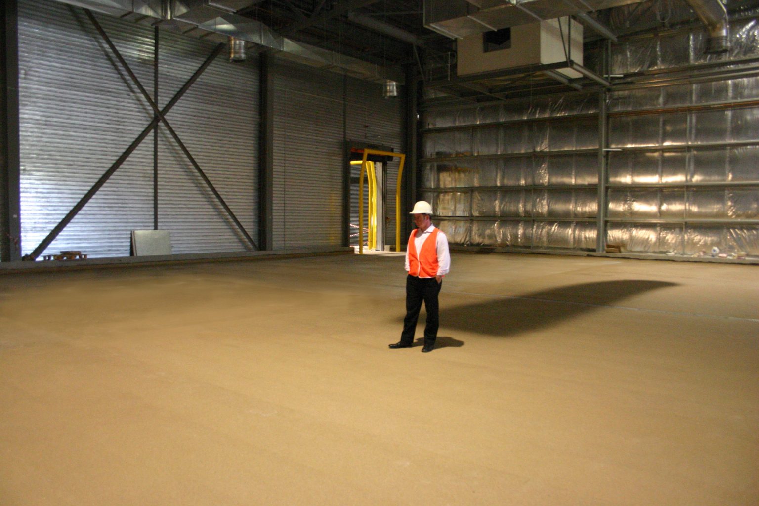 Compressed construction schedules – coating & topping application to new concrete slabs